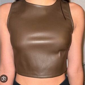Brand New Kirious Los
Angeles Black Faux leather top
